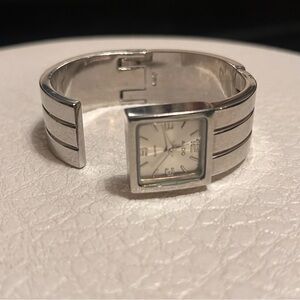 ALDO Women’s Silver Tone Cuff Watch Stainless Steel. 3/4’ Cuff Width O/S